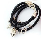 A Black Gold Charm Wrap Bracelet